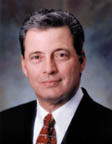 THOMAS J. MANENTI